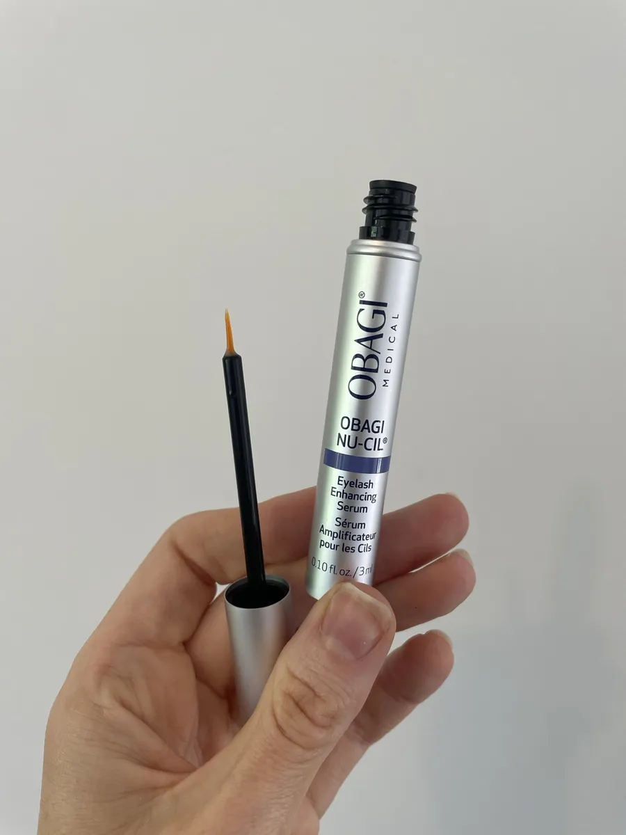 Obagi Nu-Cil open applicator and brush photographed by The Lash List