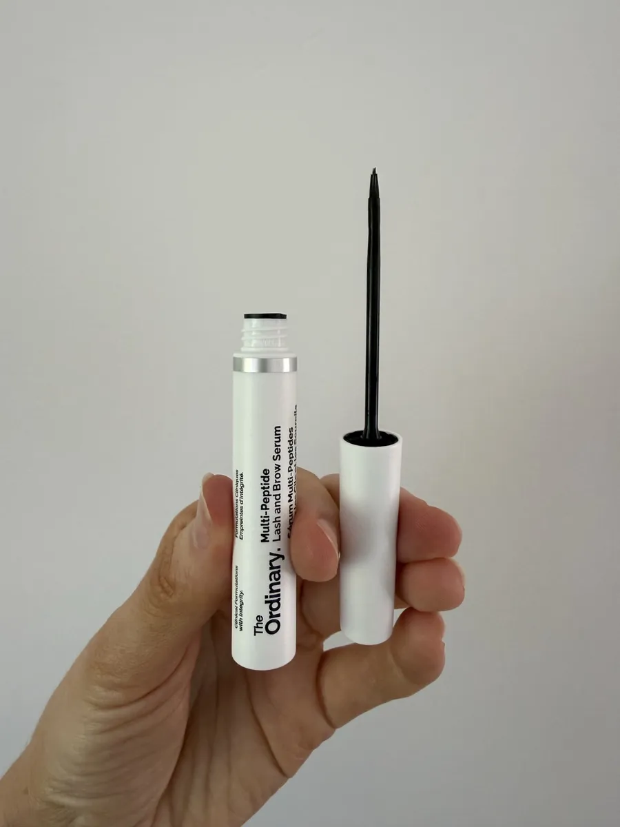The Ordinary Multi-Peptide Lash & Brow Serum open applicator and brush photographed by The Lash List