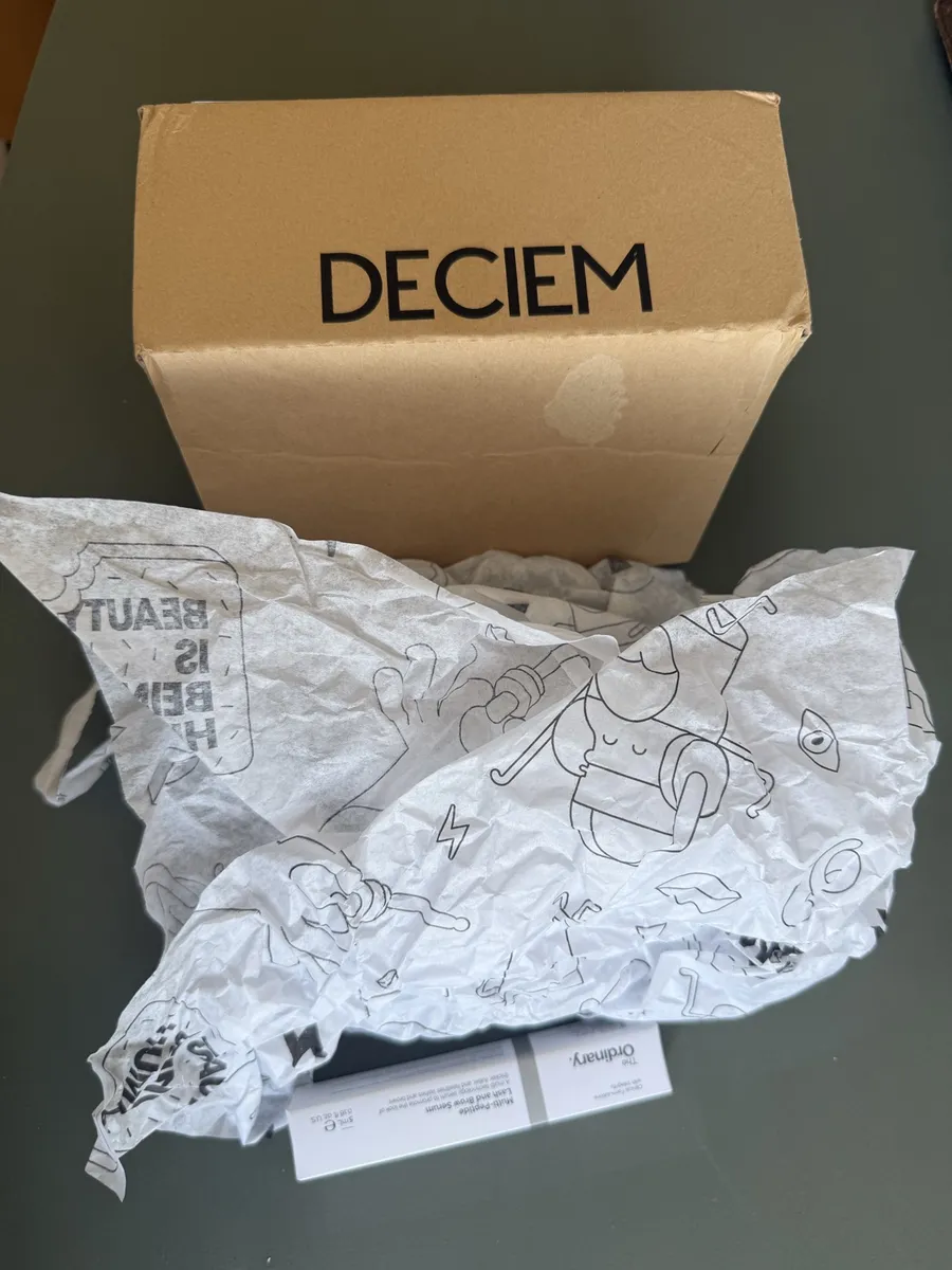 The Ordinary direct-order Deciem box and tissue photographed by The Lash List