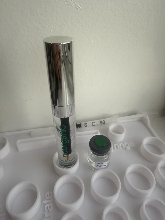 NuOrganic Cosmic Lash tube beside its labeled test sample in The Lash List comparison workspace