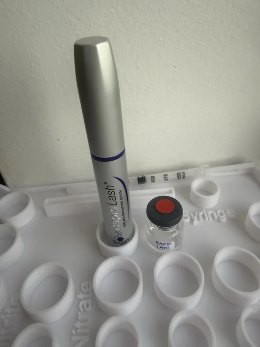 RapidLash tube beside its labeled test sample in The Lash List comparison workspace